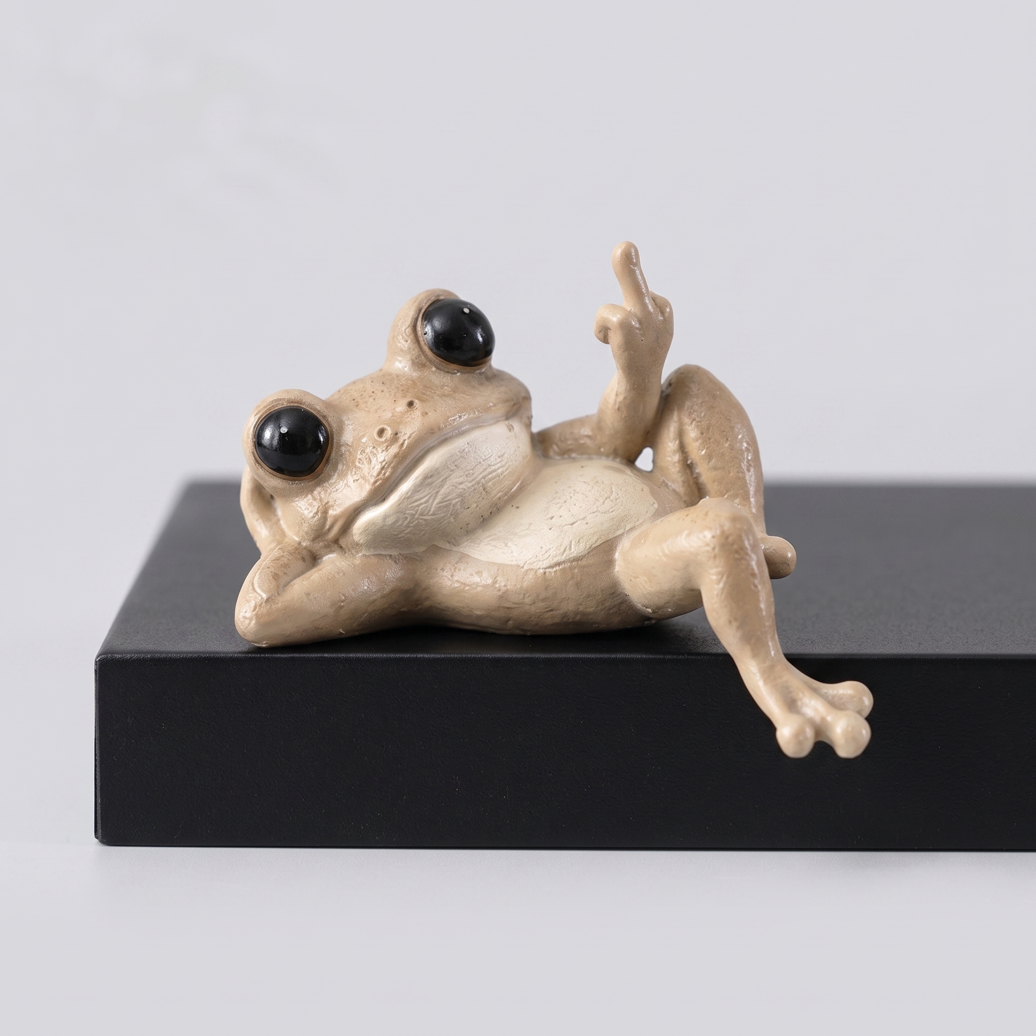 Middle Finger Lounging Frog Figurine