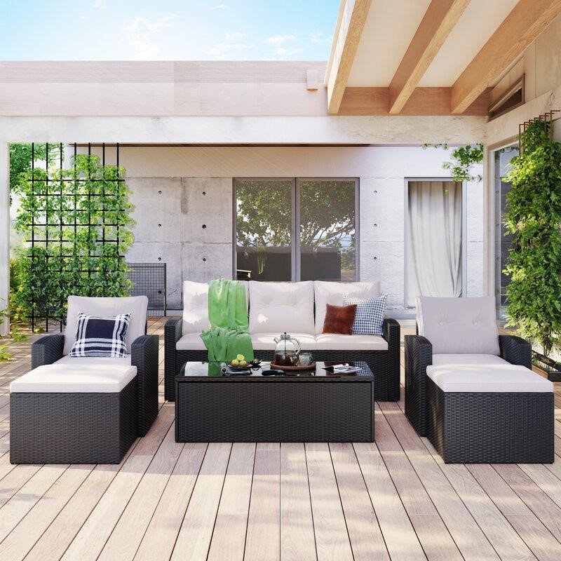 Jakye Wicker/Rattan 7 - Person Seating Group with Cushions
