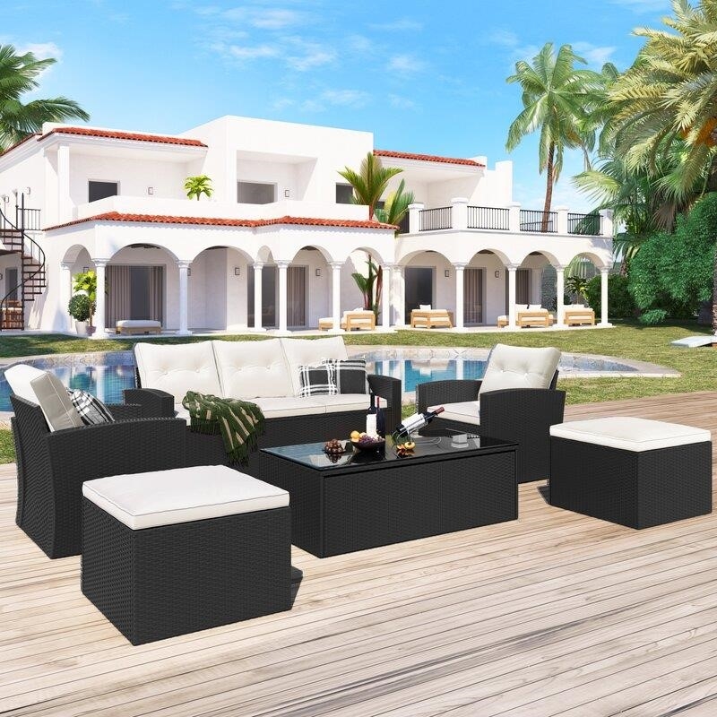 Jakye Wicker/Rattan 7 - Person Seating Group with Cushions