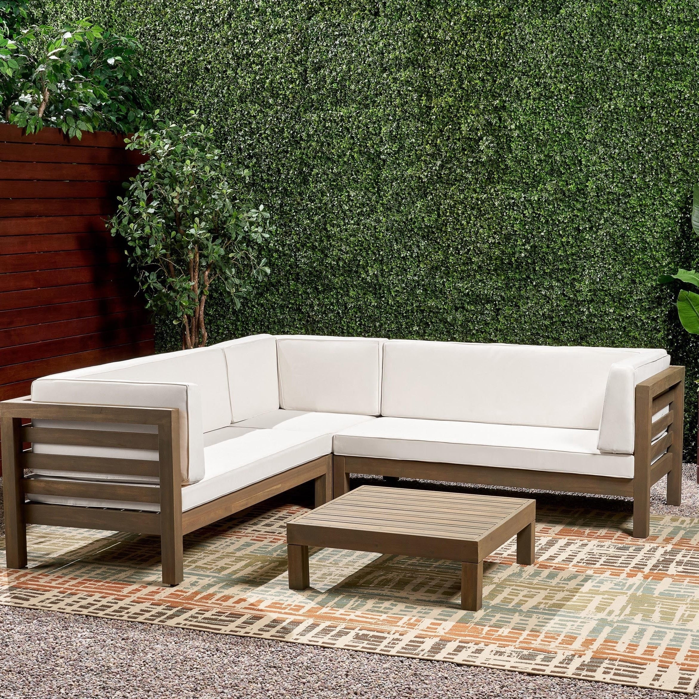 Oana Outdoor 5 Seater V Shaped Mid-Century Modern Acacia Wood Sectional Sofa Set with Coffee Table by Christopher Knight Home