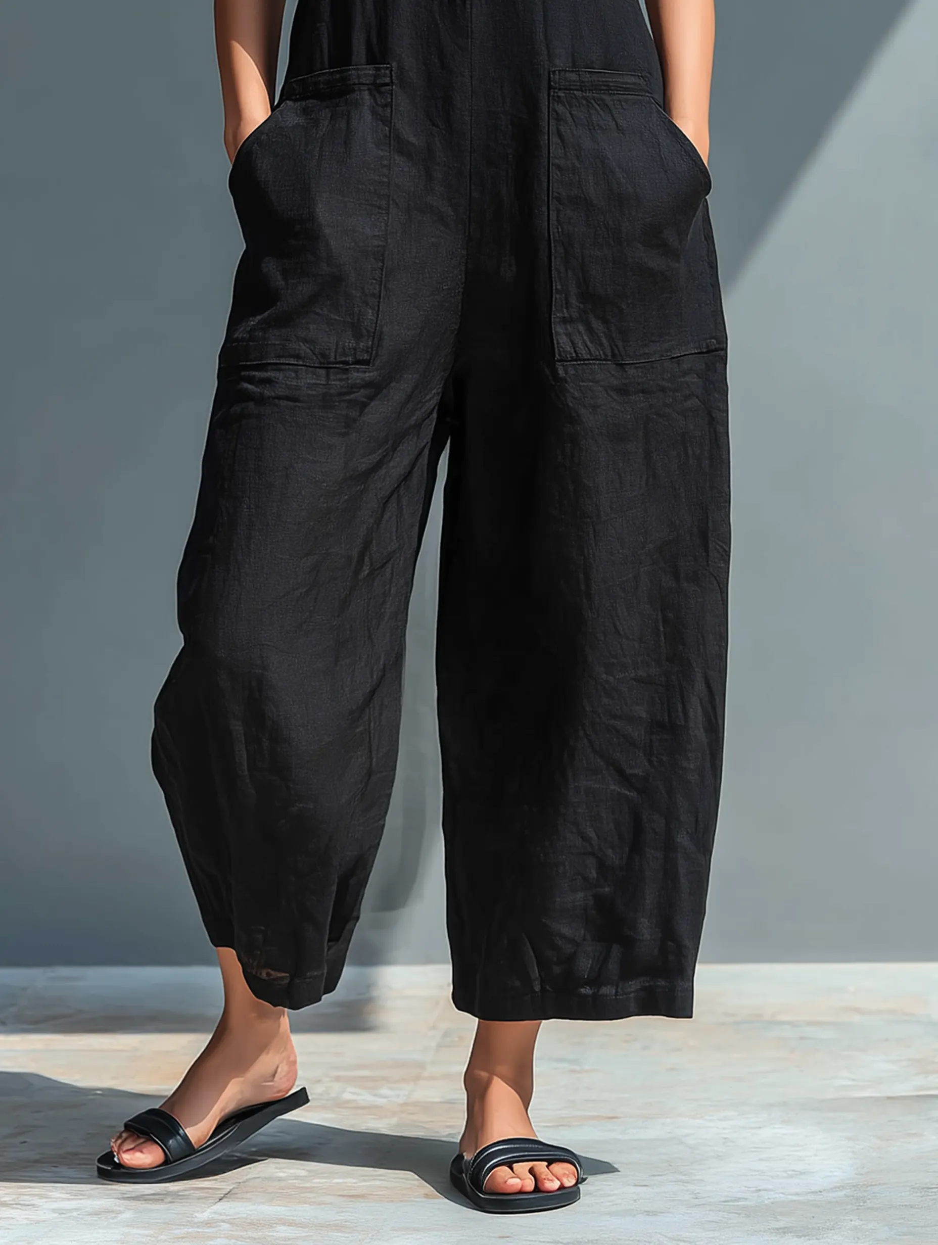 Women's Minimalist Linen Blend Button-up Stand-collar Sleeveless Loose Jumpsuit